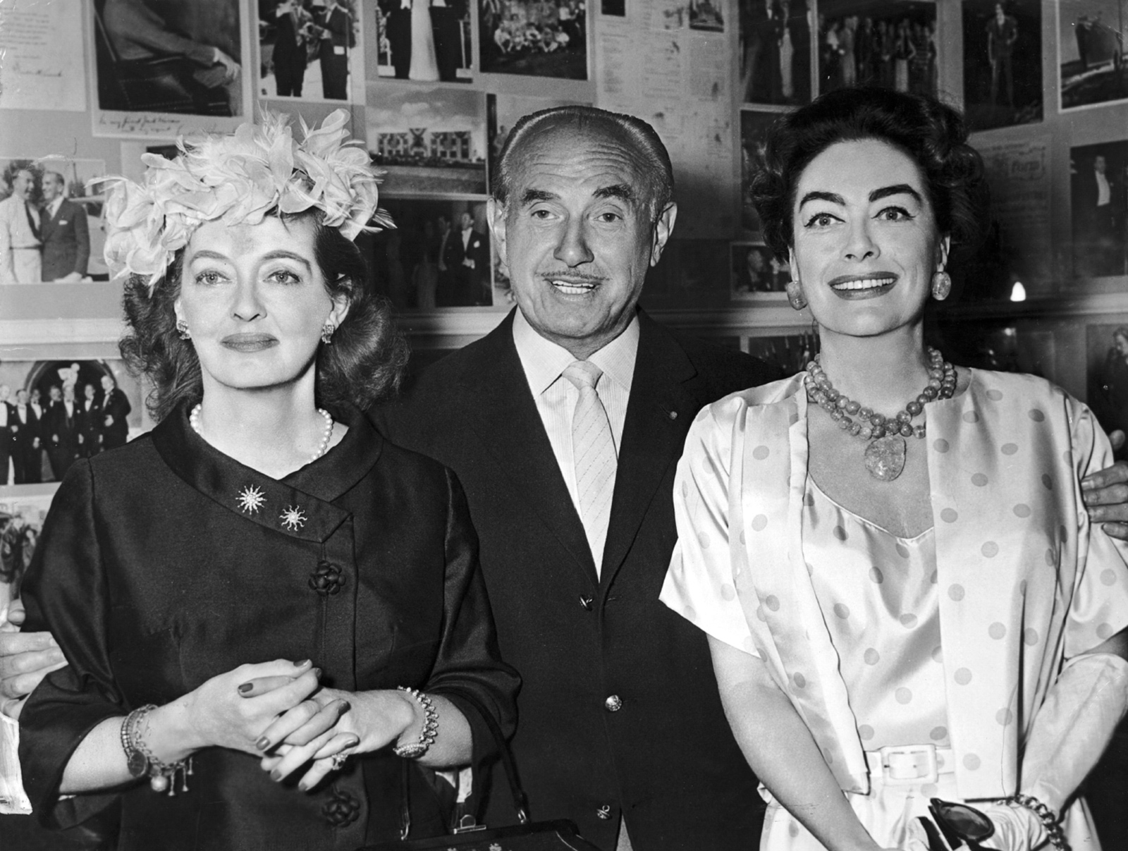 Jack Warner with Bette Davis and Joan Crawford, stars of the Warner Brothers film What Ever Happened to Baby Jane?, circa 1962