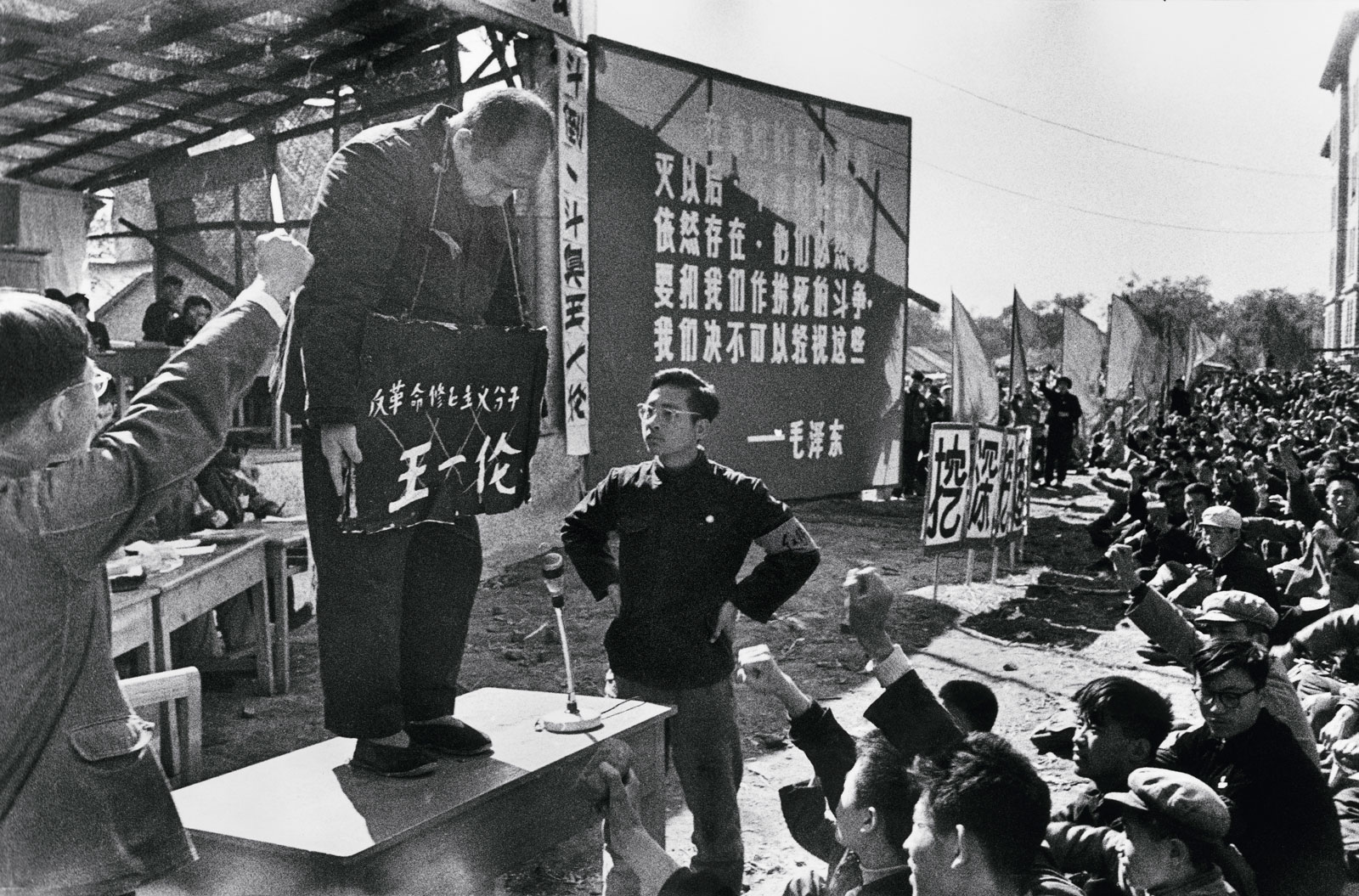 Provincial Party Secretary Wang Yilun, one of Heilongjiang's most powerful leaders, is criticized by Red Guards from the University of Industry and forced to bear a placard around his neck with the accusation "counterrevolutionary revisionist element," Harbin, northern China, August 23,1966