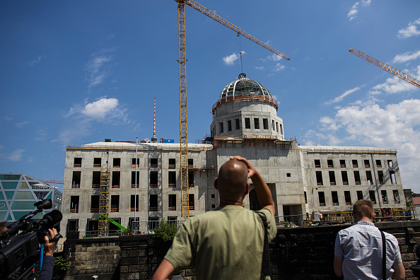 Visitors attend the topping-out ceremony for the Humboldt Forum, Berlin, Germany, June 12, 2015