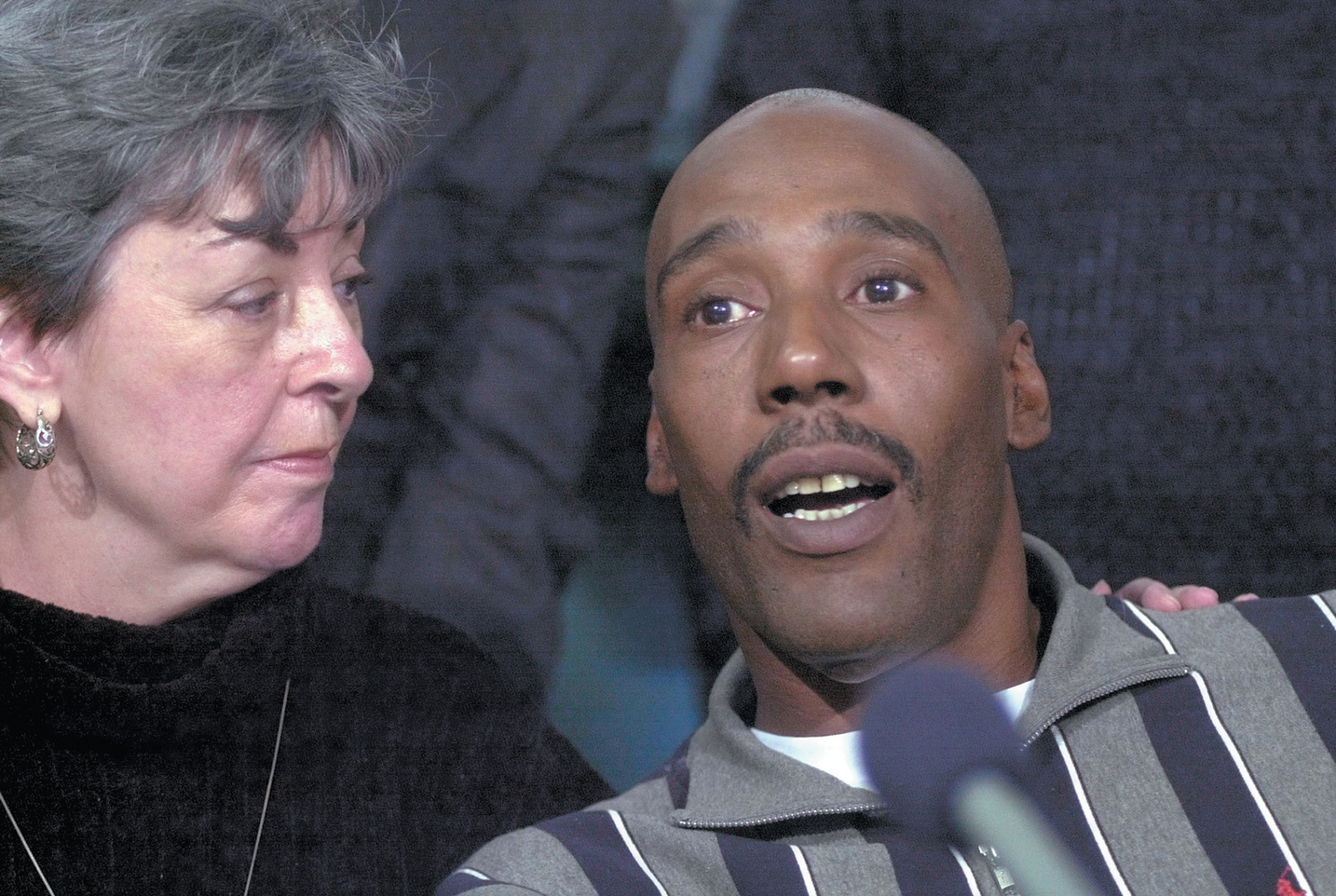 Earl Washington, who in 1984 was wrongfully convicted of rape and murder, with Marie Deans, a member of his legal team, at a press conference in Virginia Beach after he was freed from prison, February 2001. Washington spent more than seventeen years in prison—many of them on death row—and once came within nine days of execution. He was exonerated after DNA testing proved his innocence.