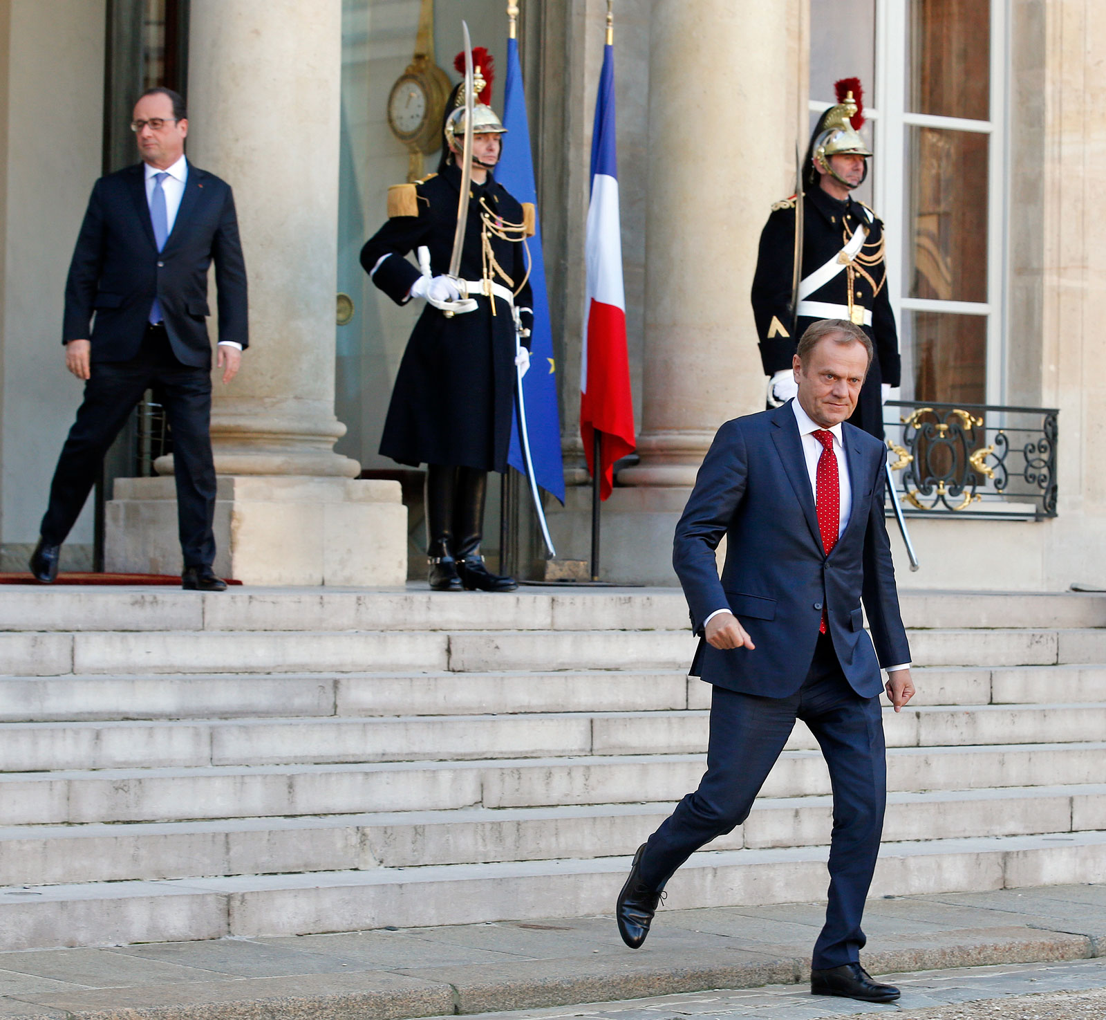 European Council President Donald Tusk leaves the Elysee Palace following a meeting with French President Francois Hollande in Paris, France, November 23, 2015