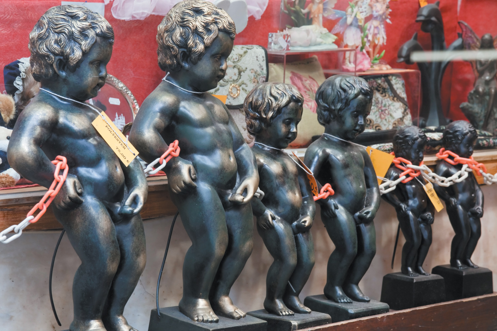 Replicas of ‘the most famous symbol of the city,’ the seventeenth-century bronze figure of the Manneken Pis, or ‘Little Pisser,’ for sale in Brussels, 2009