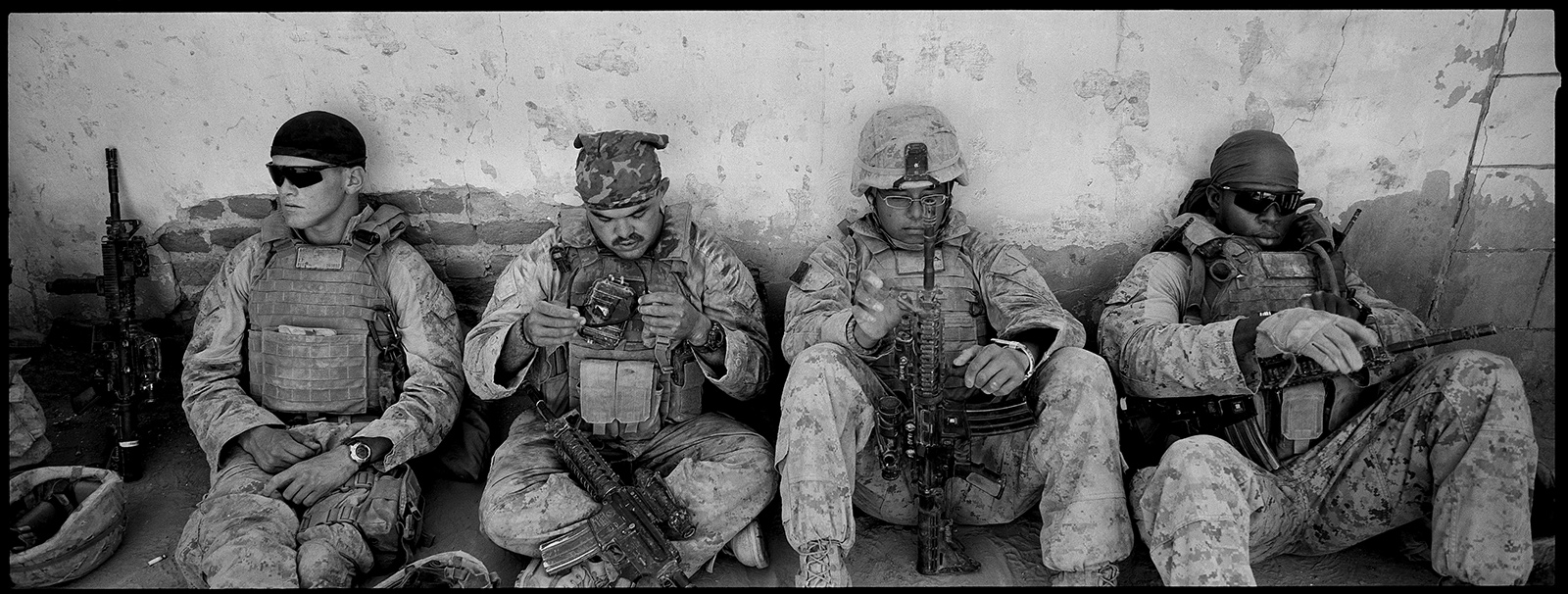 US Marines about to go on patrol in Khan Neshin, Helmand province, Afghanistan, 2009; photograph by Stephen Dupont from his book Generation AK: The Afghanistan Wars 1993–2012, published last fall by Steidl