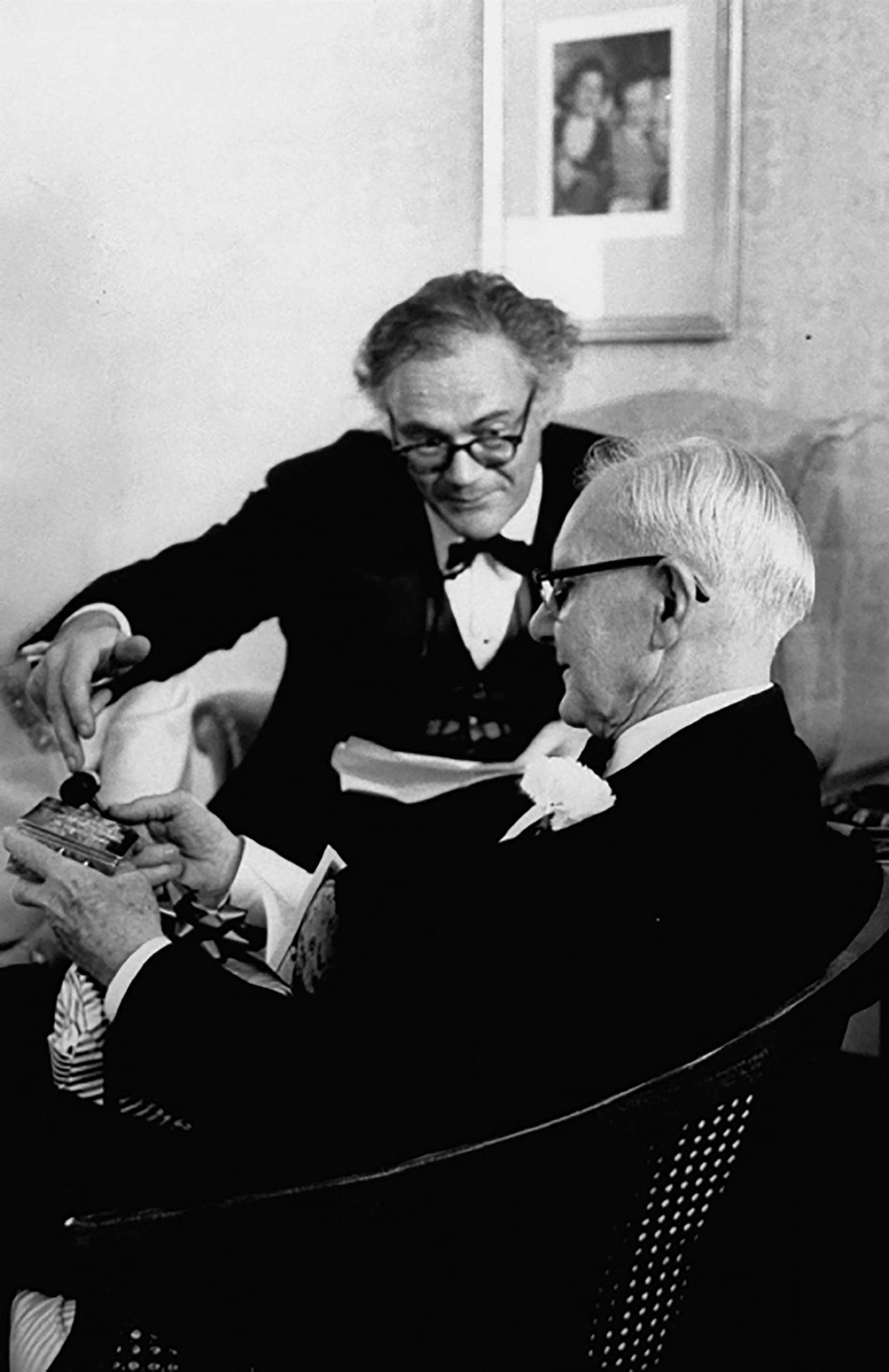 Robert Lowell giving John Crowe Ransom a gift for his eightieth birthday, 1968