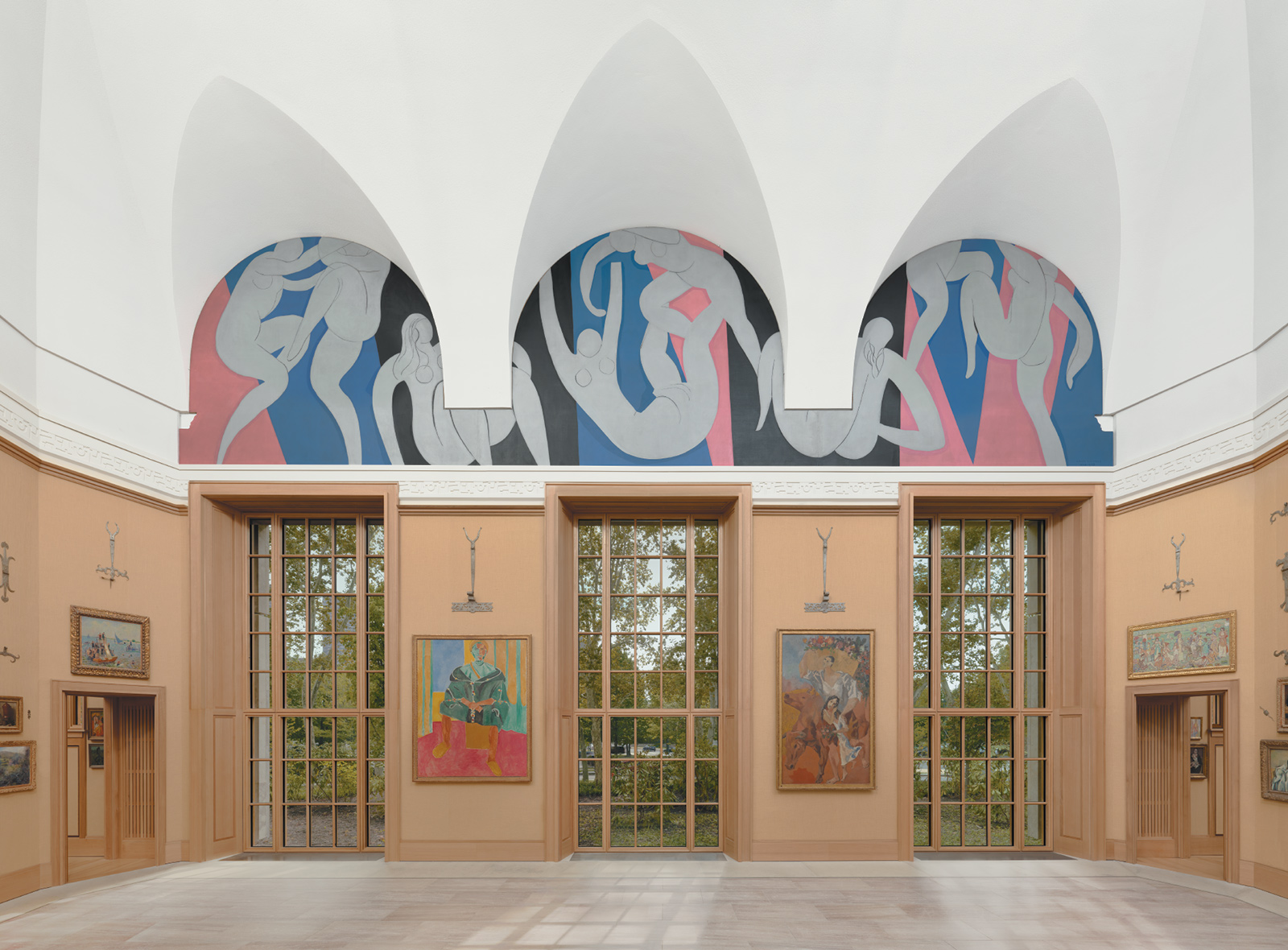 Matisse’s first major mural, The Dance (1932–1933), commissioned by Albert Barnes in 1930 and installed at the new Barnes Foundation museum building in Philadelphia in 2012. Below are works by William James Glackens, Matisse, Picasso, and Maurice Brazil Prendergast.