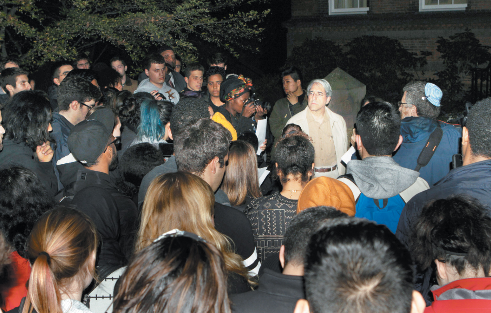 Students reading a set of demands to Yale President Peter Salovey in front of his house, New Haven, Connecticut, November 2015