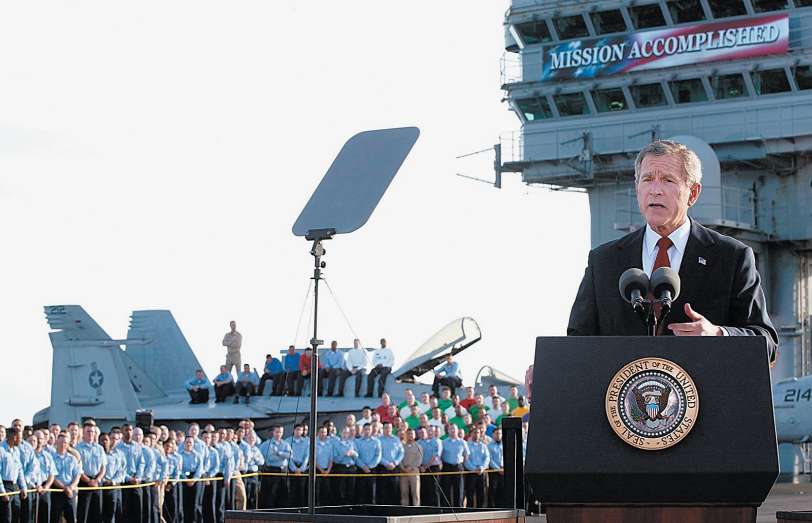 George W. Bush on the deck of the USS Abraham Lincoln, declaring the end of major fighting in Iraq, May 2003