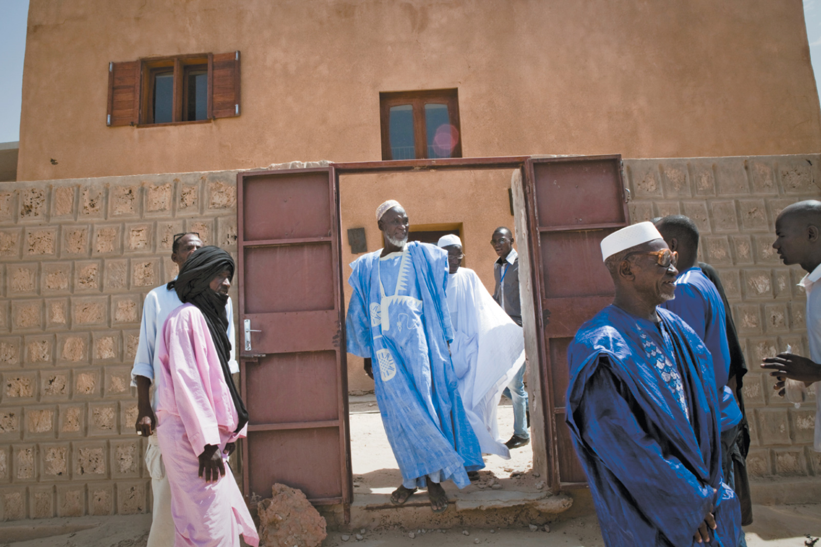 Community leaders leaving a ceremony honoring Timbuktu’s Crisis Committee, formed the year before to mediate between the civilian population and the jihadists during the Islamist takeover, October 2013