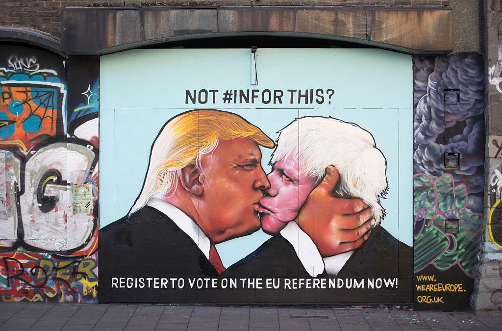 A mural showing Donald Trump sharing a kiss with former London Mayor and leading Brexit supporter Boris Johnson, Bristol, England, May 24, 2016