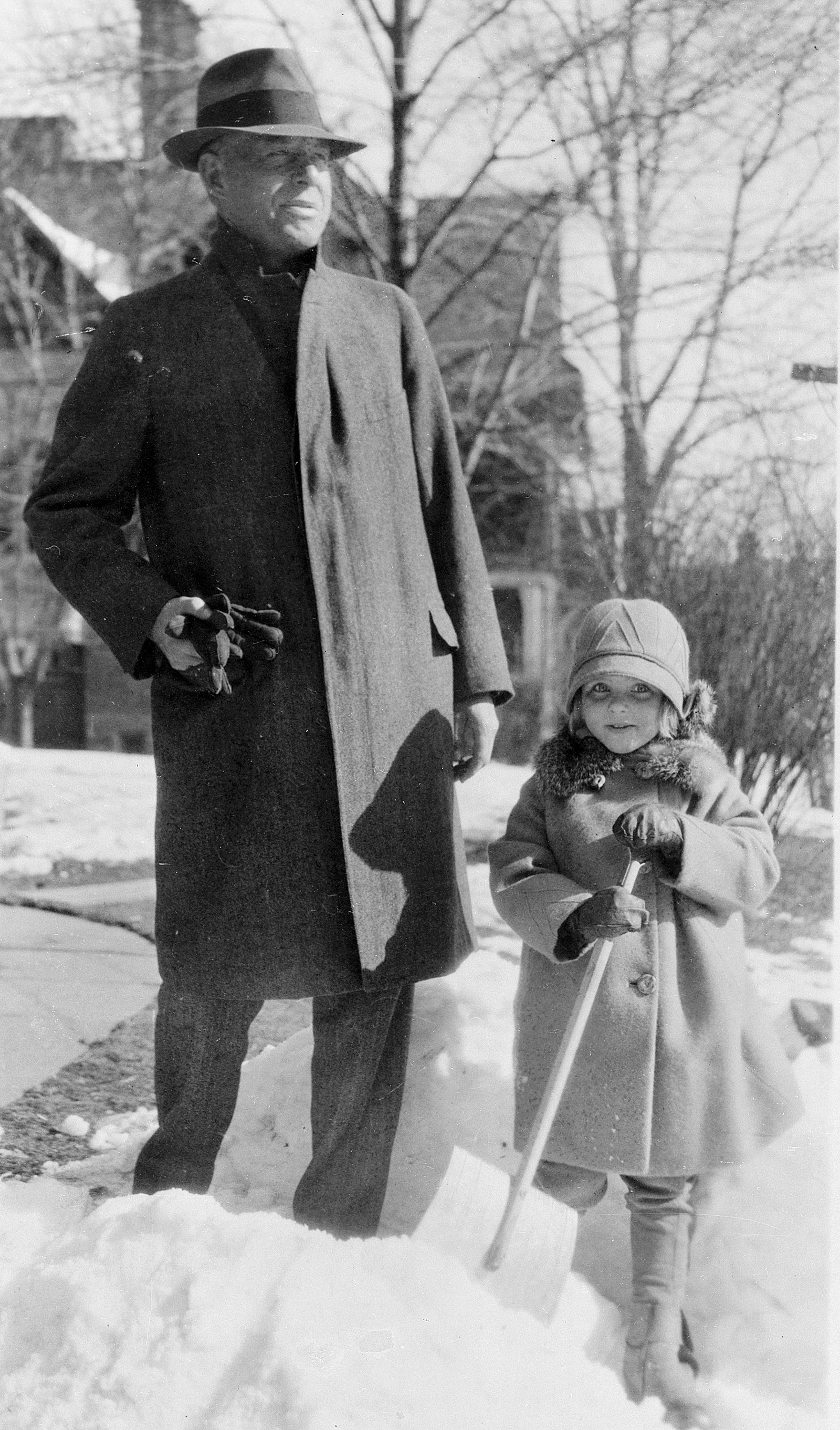 Wallace Stevens with his daughter Holly in front of their apartment in Hartford, Connecticut, 1929