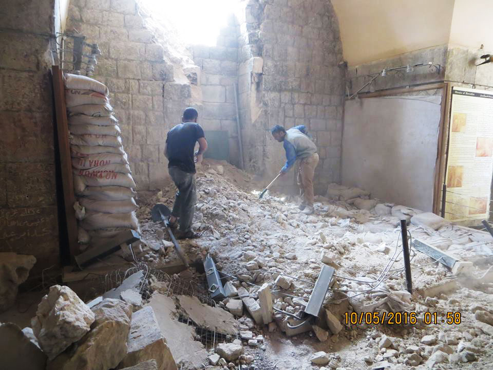 The mosaic museum in Ma’arrat al-Numan, northwestern Syria, following an airstrike by the Syrian government in May 2016; mosaics at left were protected by a wall of sandbags