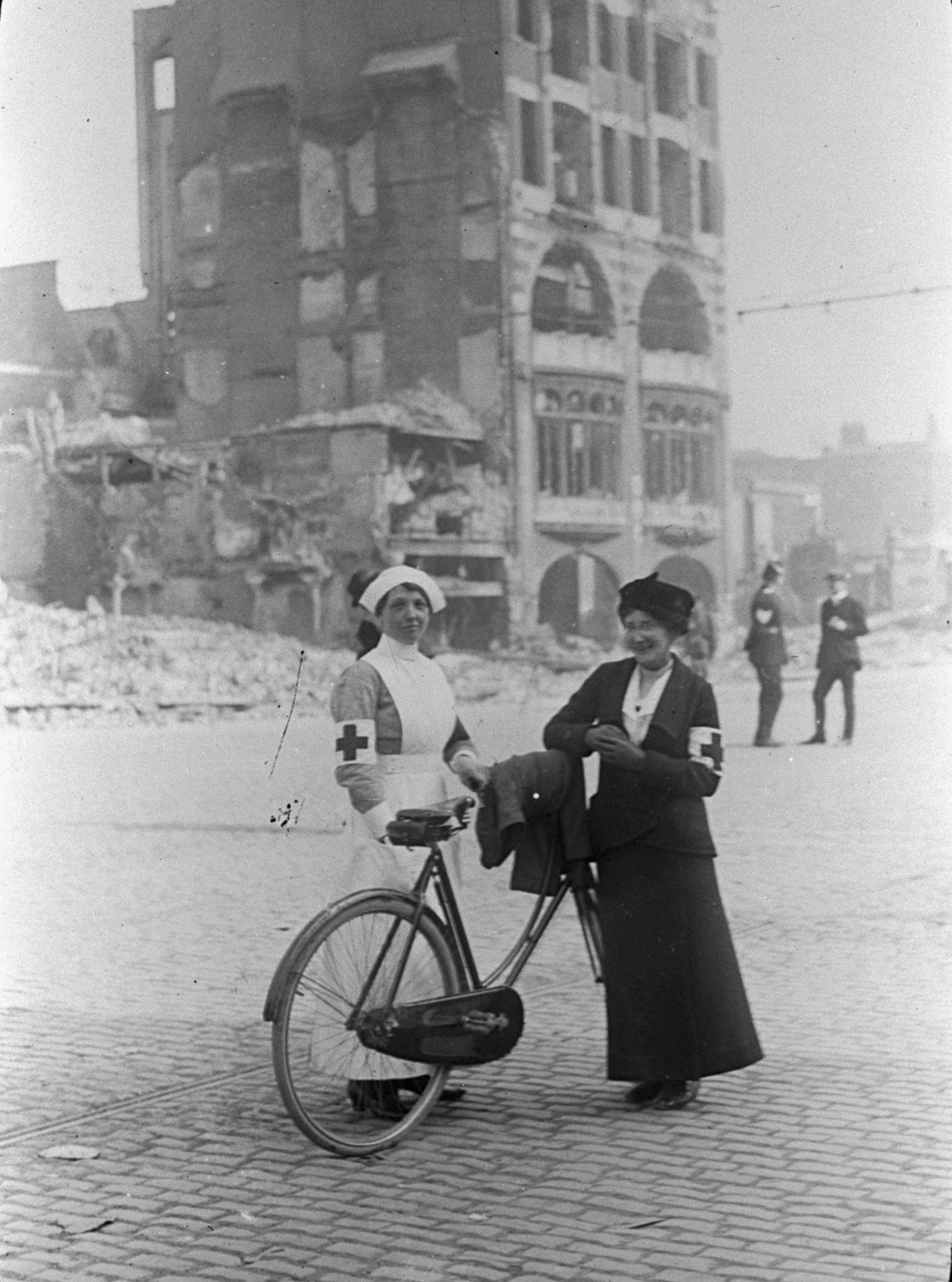Nurses in front of a shelled building in Dublin after the Easter Rising of 1916