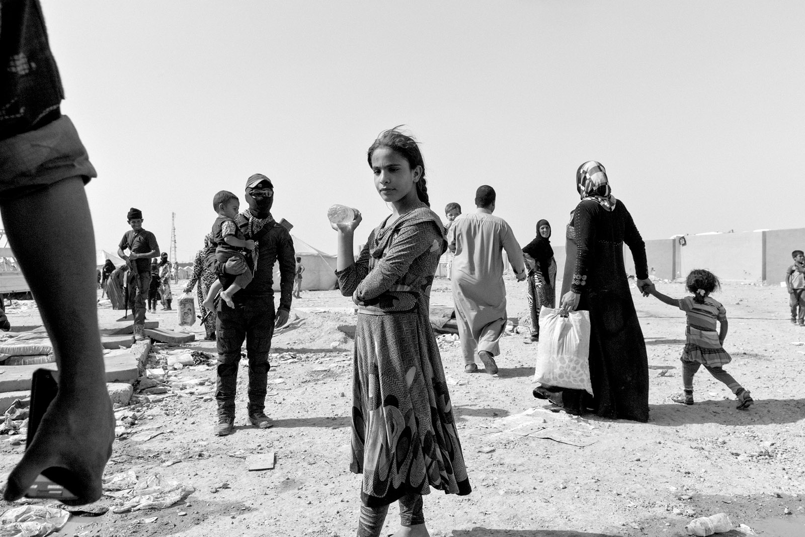 Iraqi civilians fleeing from the ISIS-controlled towns of Shirqat and Gwer, which Iraqi and Kurdish forces were attempting to recapture as part of the Mosul offensive, July 2016