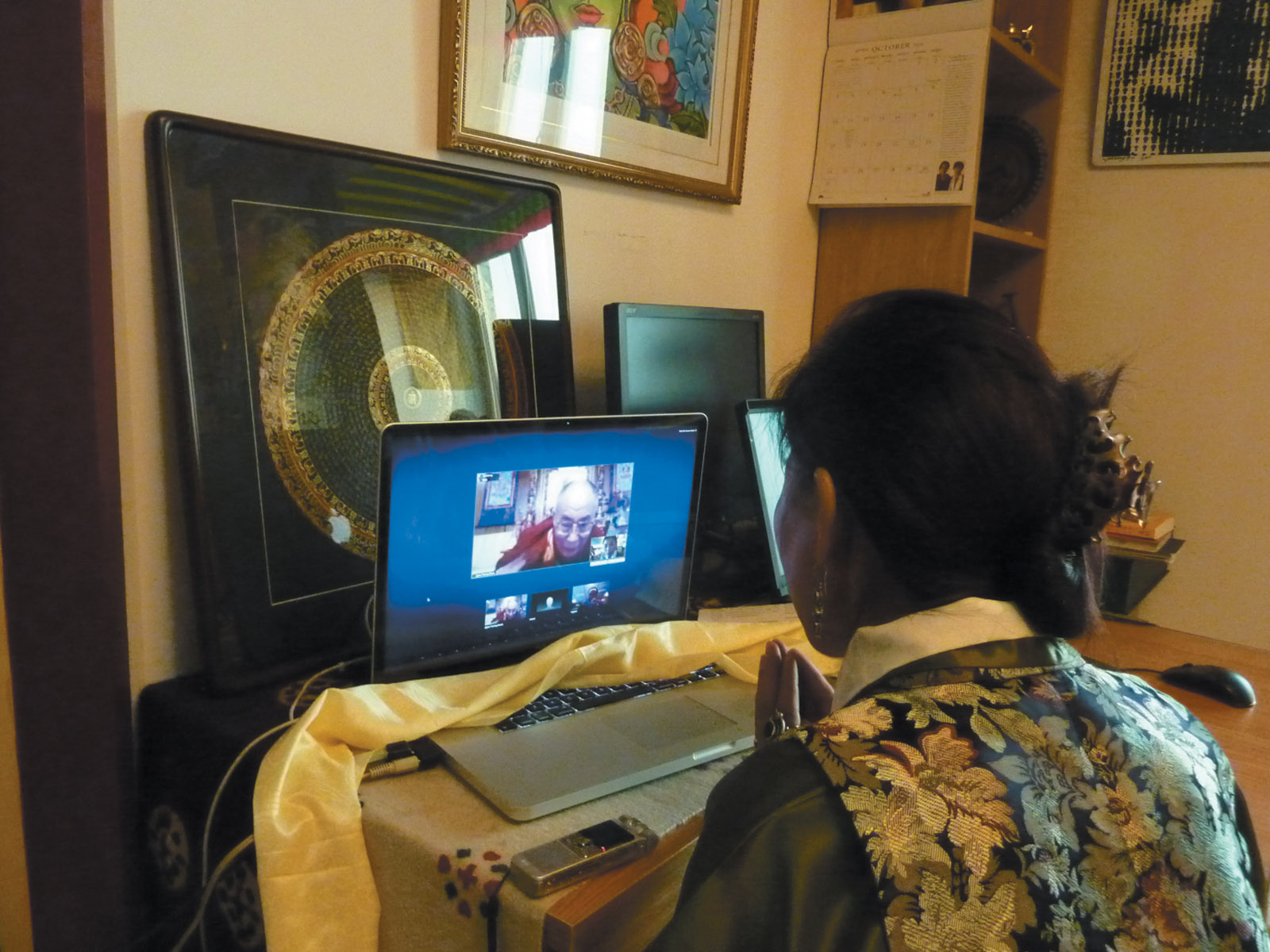 Tsering Woeser meeting the Dalai Lama over the Internet during a video conversation organized by her husband, the Chinese writer Wang Lixiong, and the Chinese human rights lawyers Teng Biao and Jiang Tianyong, Beijing, January 2011