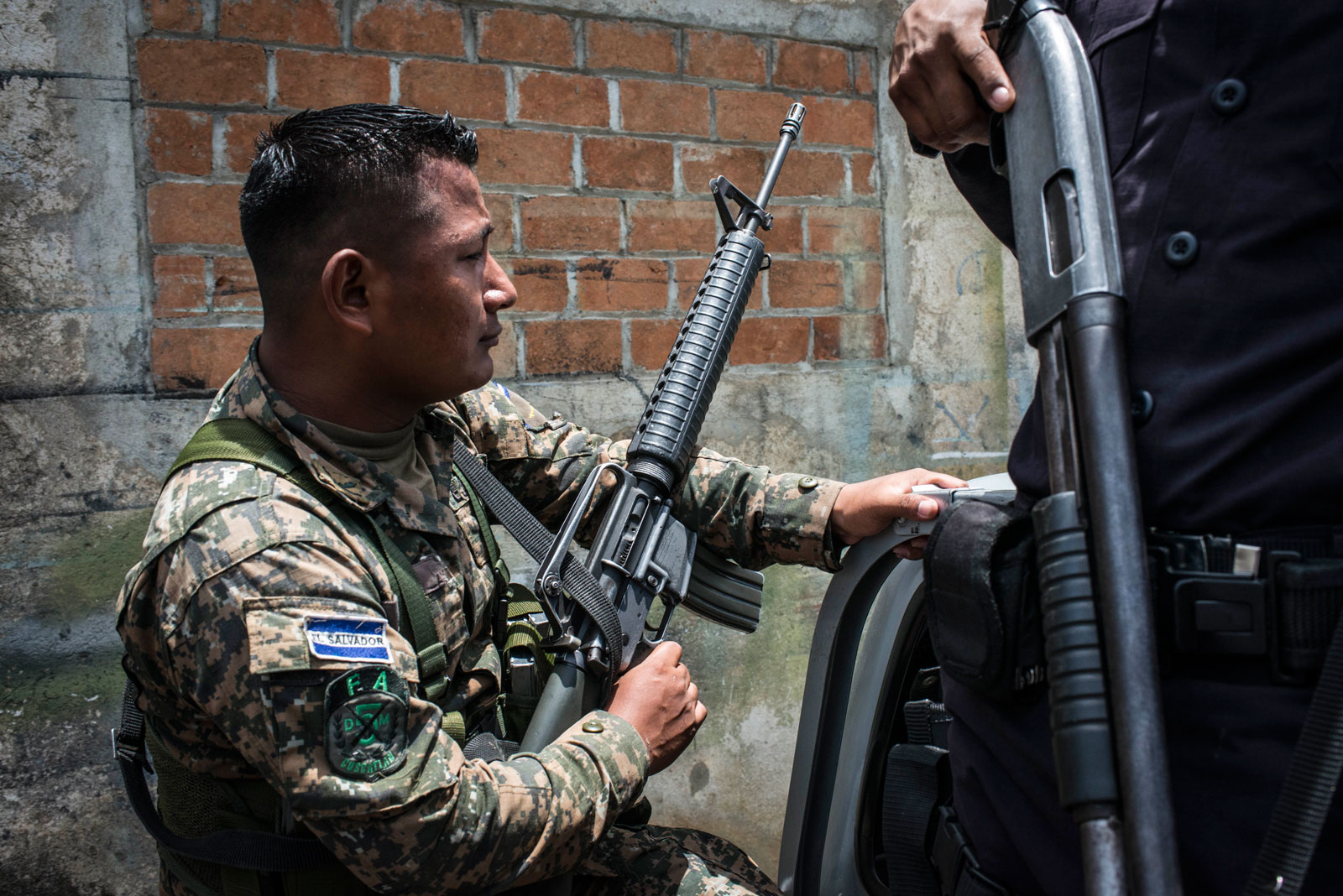 A soldier in San José Guayabal, El Salvador, August 21, 2016