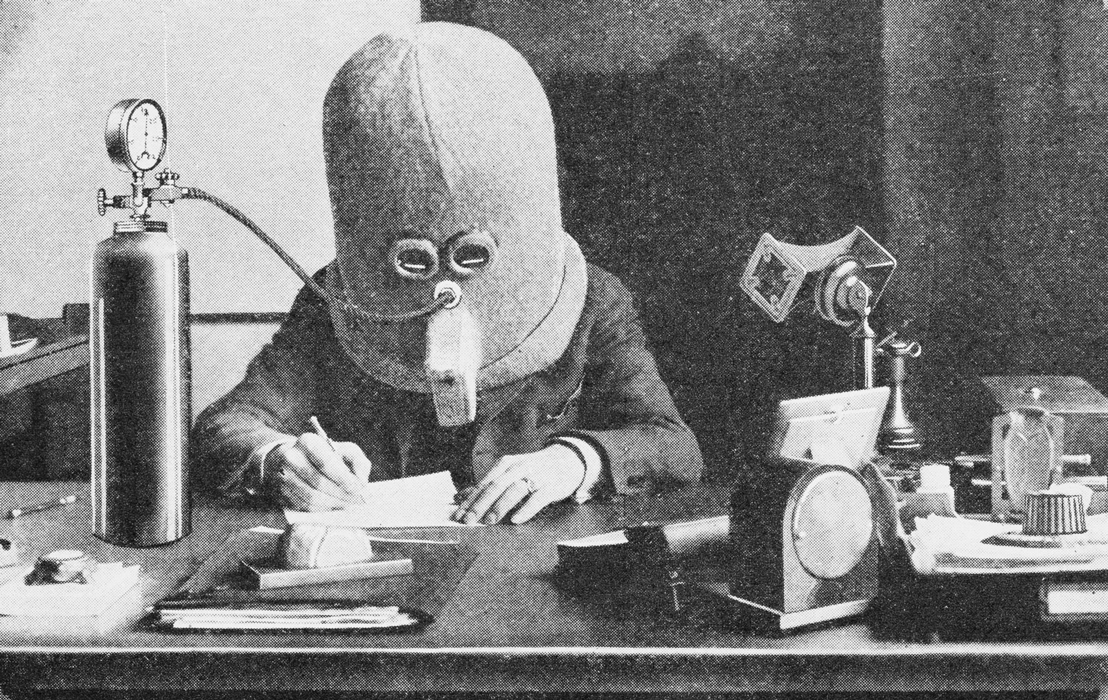 Hugo Gernsback wearing his Isolator, which eliminates external noises for concentration, from Science and Invention, July, 1925
