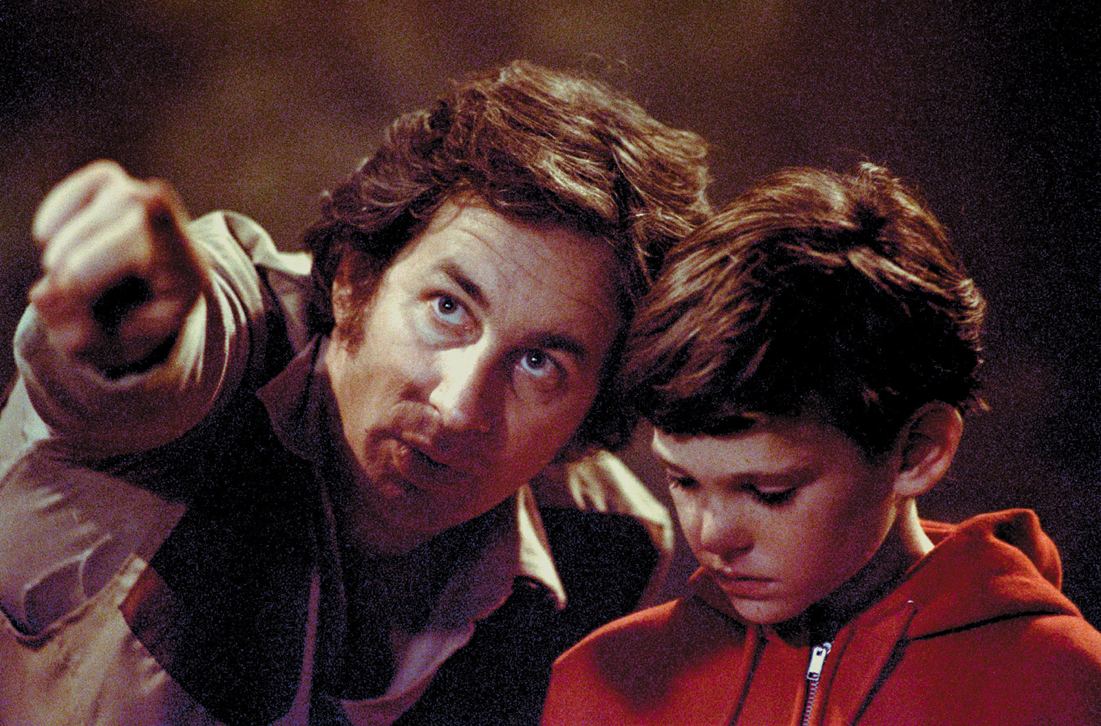 Steven Spielberg and Henry Thomas on the set of E.T., 1982