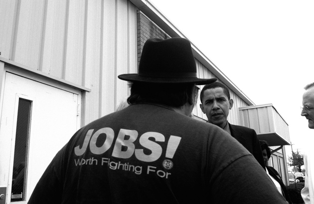 Barack Obama meeting with representatives of the United Auto Workers at a Mitsubishi factory in Bloomington, Illinois, during his campaign for the US Senate, May 2004

