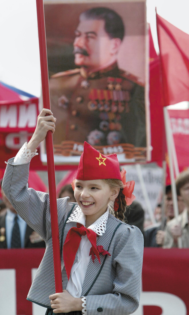 A pro-Communist demonstration in Moscow, with a portrait of Stalin in the background, May 1, 2005
