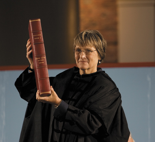 Drew Gilpin Faust during her swearing-in as president of Harvard University, Cambridge, Massachusetts, October 2007. She is holding College Book I, a compilation of official Harvard records from 1639 to 1795.
