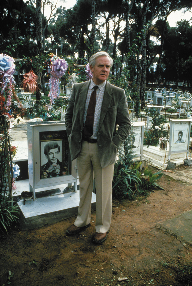 John le Carré at the Palestinian martyrs’ cemetery, Beirut, Lebanon, 1983; photograph by Don McCullin
