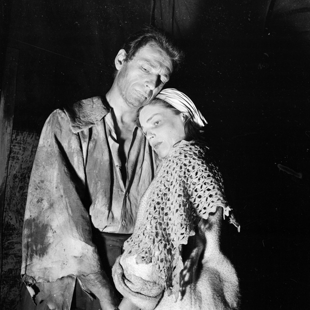 Yves Montand and Simone Signoret as John and Elizabeth Proctor in a production of Arthur Miller’s The Crucible, at the Sarah Bernhardt Theater, Paris, 1955
