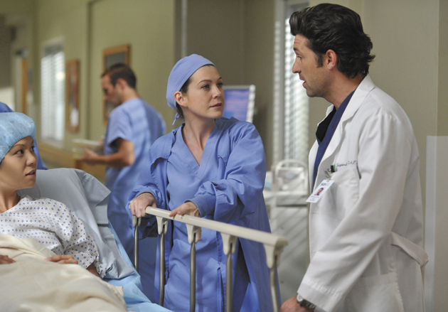 Ellen Pompeo and Patrick Dempsey as doctors on an episode of Grey’s Anatomy