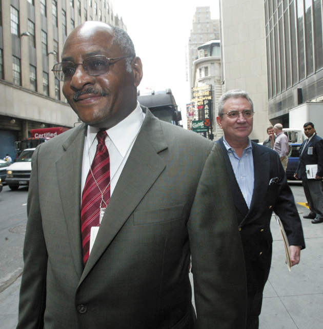 Gerald Boyd, the managing editor of The New York Times, and Howell Raines, the executive editor, on their way to a meeting about the Jayson Blair scandal, New York City, May 14, 2003
