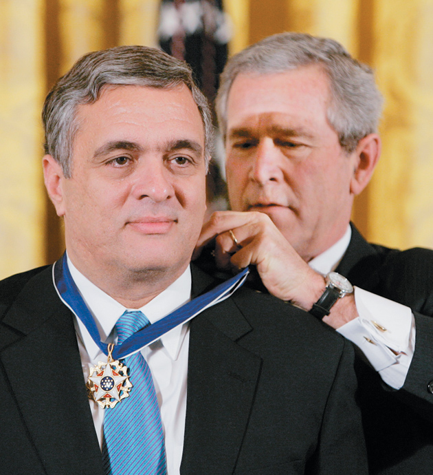 George W. Bush awarding the Presidential Medal of Freedom to former CIA director George Tenet, Washington, D.C., December 2004
