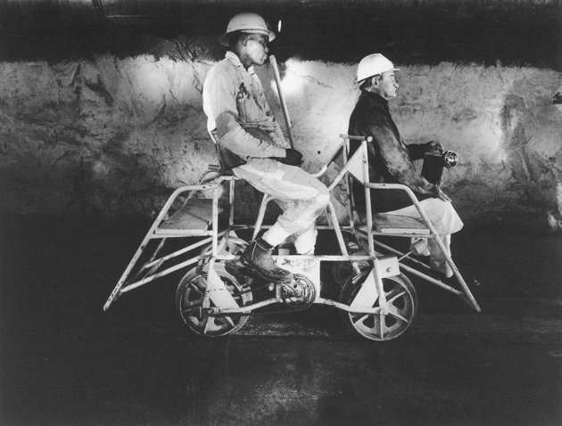 David Goldbatt: Team Leader and Mine Captain on a Pedal Car in the Rustenburg Platinum Mine, Rustenburg, 1971. For a slideshow of the photographs discussed in this review, see the NYR blog, nybooks.test/blogs.
