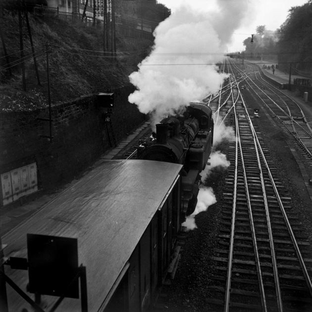 Train arriving to Paris from Switzerland near Gare de l'Est, 1950