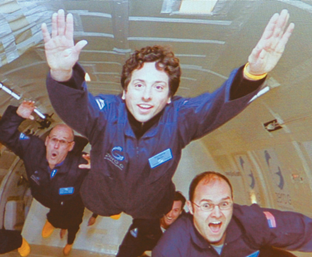 Google cofounder Sergey Brin, center, training in zero gravity for a future vacation in space, 2008