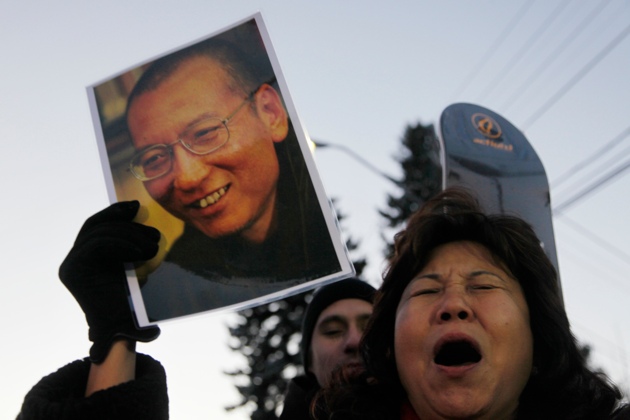 A protester for the freedom of Nobel peace laureate Liu Xiaobo outside the Chinese Embassy in Oslo, Norway, December 9, 2010
