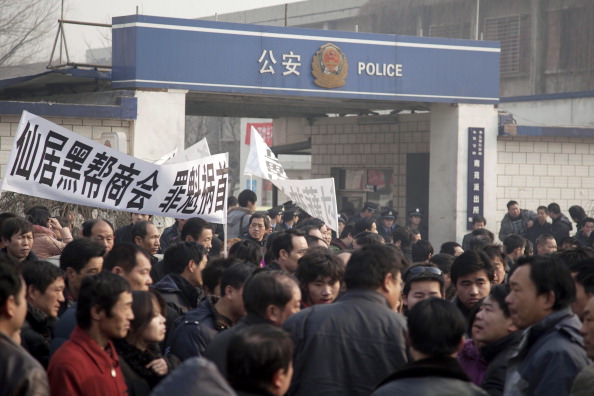 A protest outside a police station, Beijing, December 22, 2010
