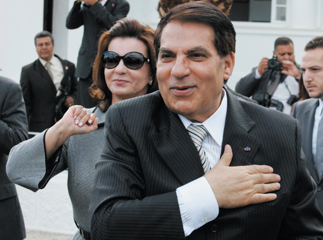 Recently deposed Tunisian President Zine el-Abidine Ben Ali and his wife, Leila, greeting supporters in an affluent Carthage neighborhood near the capital, Tunis, October 2009
