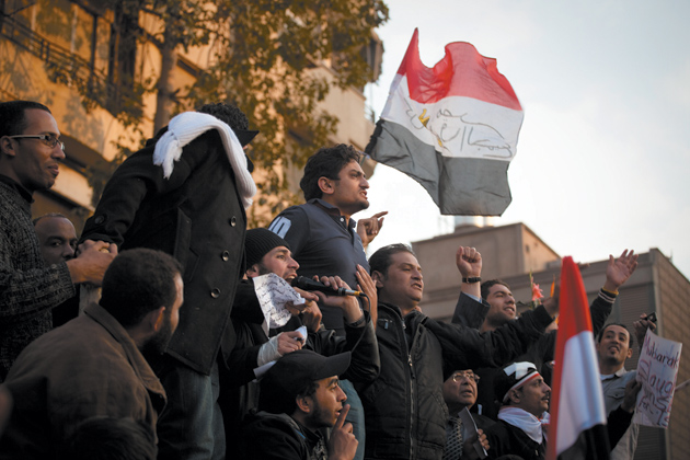 Wael Ghonim (center), the Egyptian Google executive who started the Facebook group ‘We Are All Khaled Said,’ at a protest in Tahrir Square, Cairo, February 8, 2011
