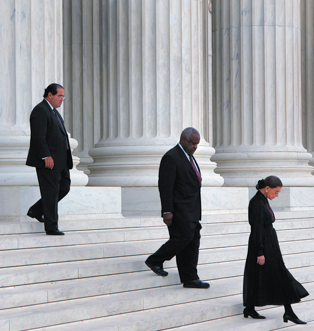 Justices Antonin Scalia, Clarence Thomas, and Ruth Bader Ginsburg leaving the Supreme Court after a ceremony honoring the late Chief Justice William Rehnquist, Washington, D.C., September 2005
