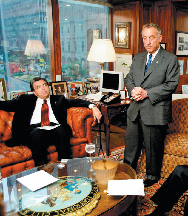 Charles Prince, left, in 2003, when he took over as chief executive of Citigroup after the resignation of Sanford Weill, right
