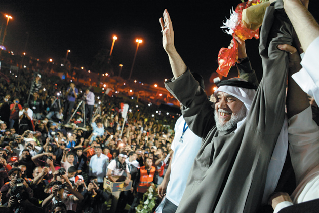 Hassan Mushayma, leader of the banned opposition group al-Haq, at a protest in the Pearl Roundabout, Manama, Bahrain, after his return from exile in London, February 26, 2011
