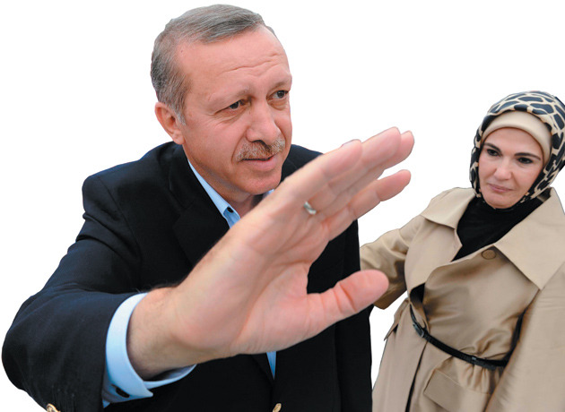 Turkish Prime Minister Recep Tayyip Erdogan and his wife Emine at a campaign rally in Istanbul, June 11, 2011
