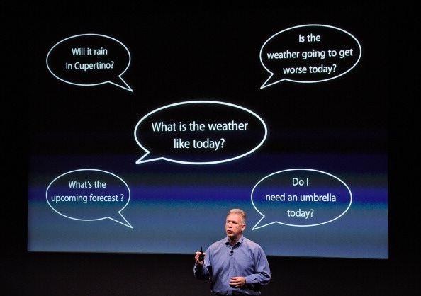 Apple's Senior Vice President of marketing Phil Schiller demonstrating features of Siri, Cuptertino, California, October 4, 2011 in Cupertino, California. 