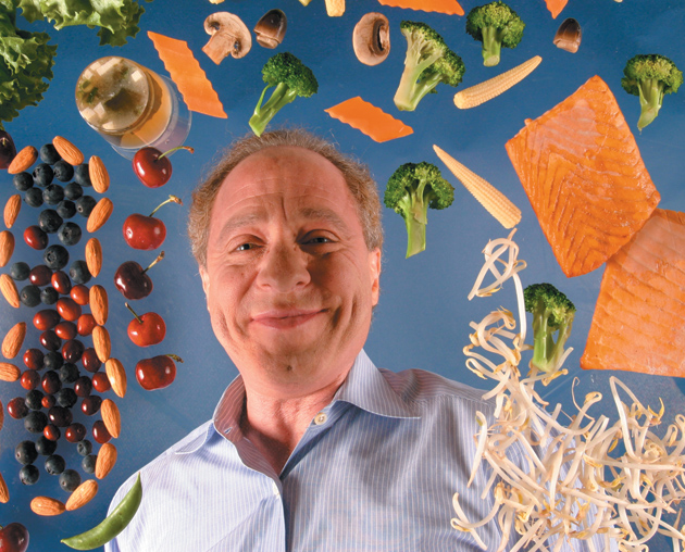 Ray Kurzweil, surrounded by some of the foods he recommends for living a longer life, November 2004
