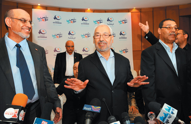 Hamadi Jebali, general secretary of Ennahda (the Renaissance Party), its leader Rached Ghannouchi, and party member Abdehhamid Jilassi at a press conference five days after Ennahda’s victory in Tunisian elections, Tunis, October 28, 2011
