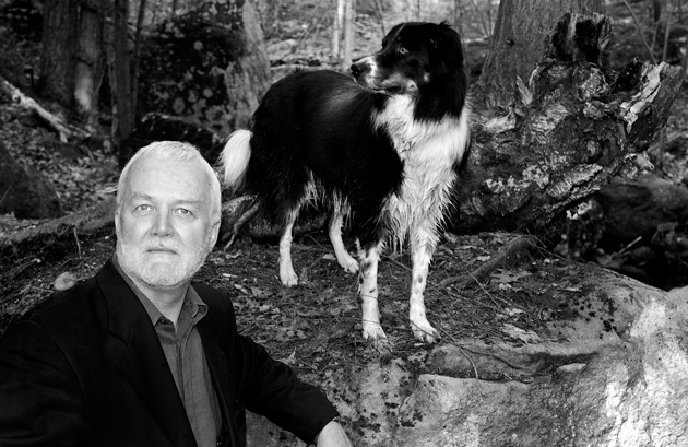 Russell Banks with one of his dogs in the Adirondacks, 2009
