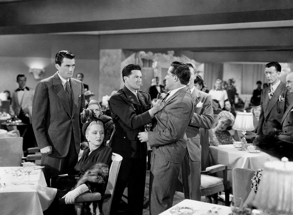 Gregory Peck, far left, as a journalist who goes undercover as a Jew for an exposé on anti-Semitism in Elia Kazan’s Gentleman’s Agreement, 1947. Also pictured are Celeste Holm, John Garfield, and Robert Karnes.