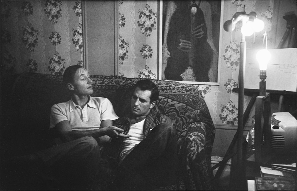 William S. Burroughs and Jack Kerouac, photographed by Allen Ginsberg in his East Village living room, 1953; from ‘Beat Memories: The Photographs of Allen Ginsberg,’ an exhibition organized by the National Gallery of Art and on view at NYU’s Grey Art Gallery until April 6, 2013. The catalog includes an essay by Sarah Greenough and is published by the National Gallery and DelMonico Books/Prestel.