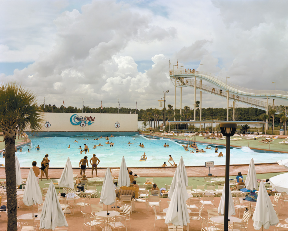 Joel Sternfeld: Wet ’n Wild Aquatic Theme Park, Orlando, Florida, September 1980; from Sternfeld’s first collection of photographs, American Prospects. Originally published in 1987, the book has recently been issued in a new edition by D.A.P./Distributed Art Publishers.