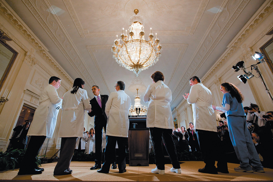 President Obama with doctors and nurses at the White House after giving a speech about health care reform, March 2010