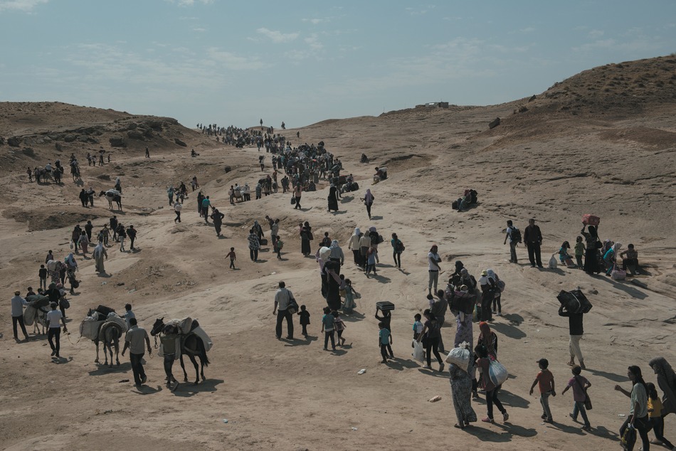 Syrian refugees crossing into northern Iraq near Dohuk, Iraq, August 21, 2013