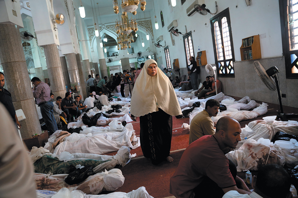 Bodies inside the Iman mosque in the Nasr City district of Cairo, before police raided the mosque and took the bodies to the morgue, August 15, 2013